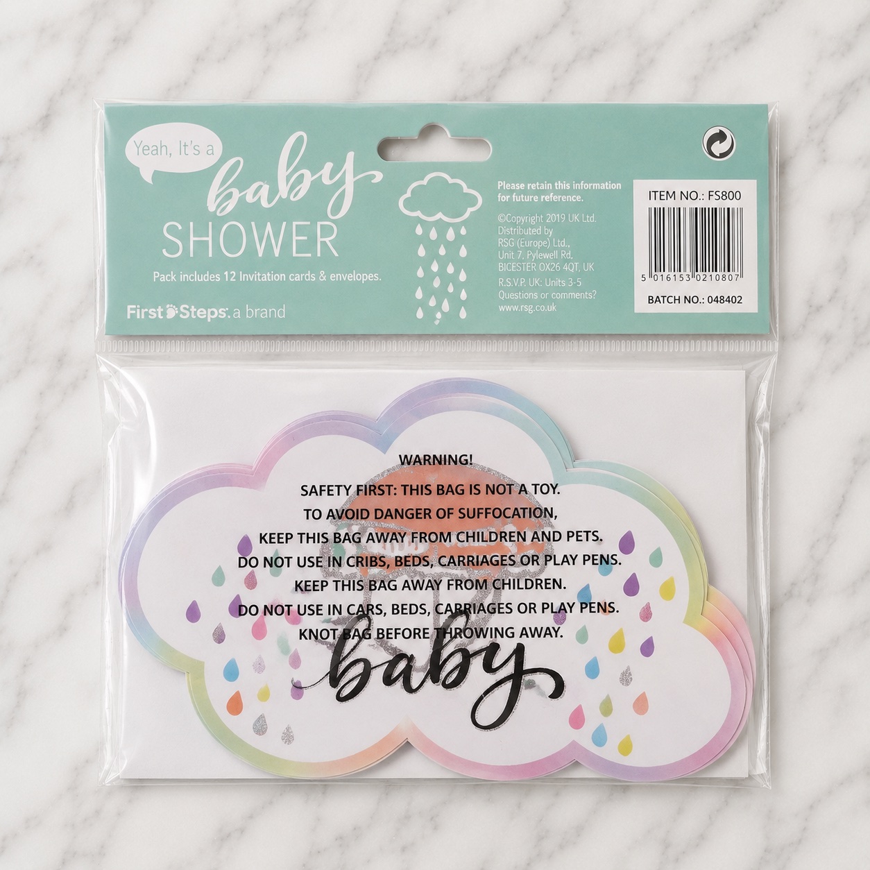 The baby shower invitation pack back showing 12 cards and envelopes