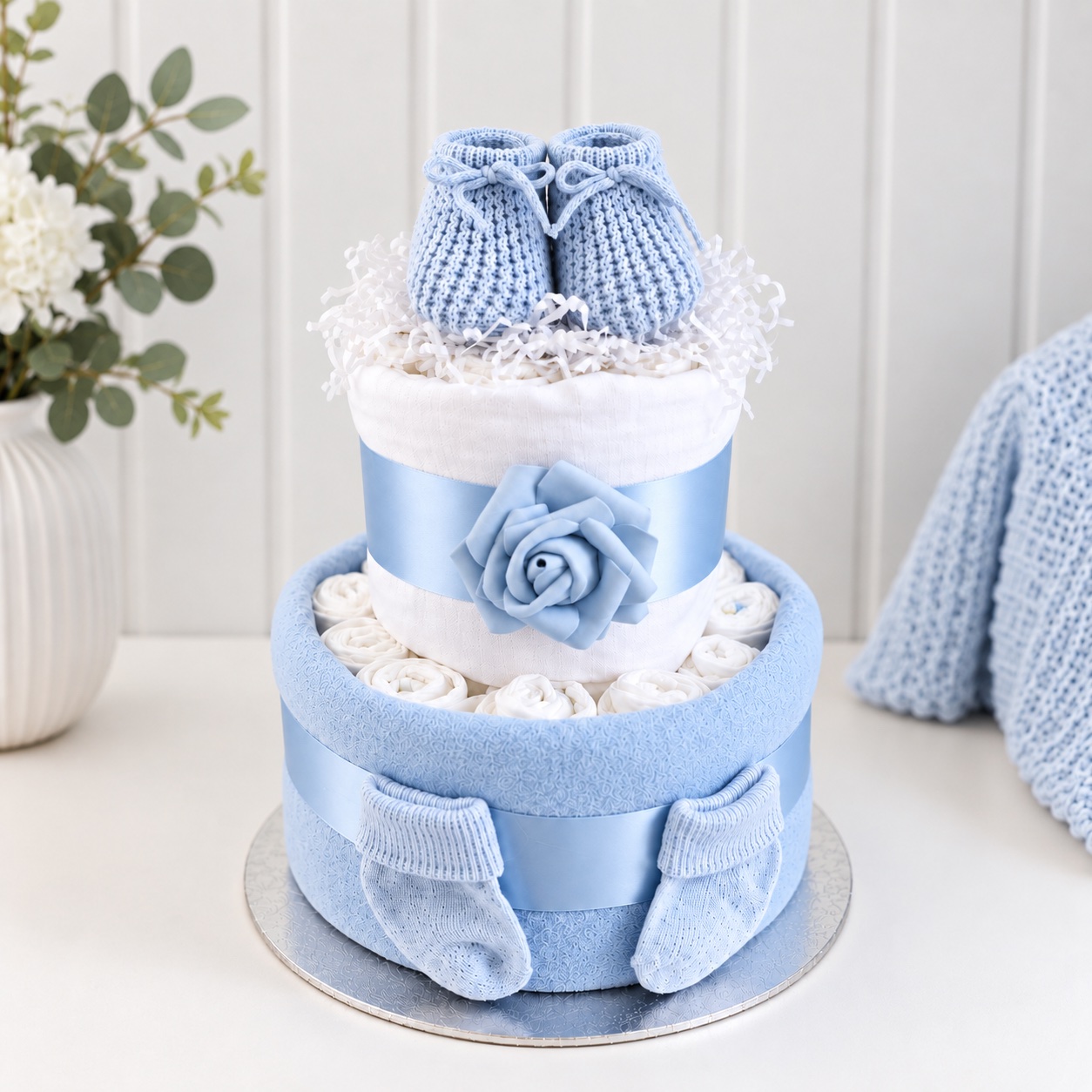 Blue booties two tier baby boy nappy cake