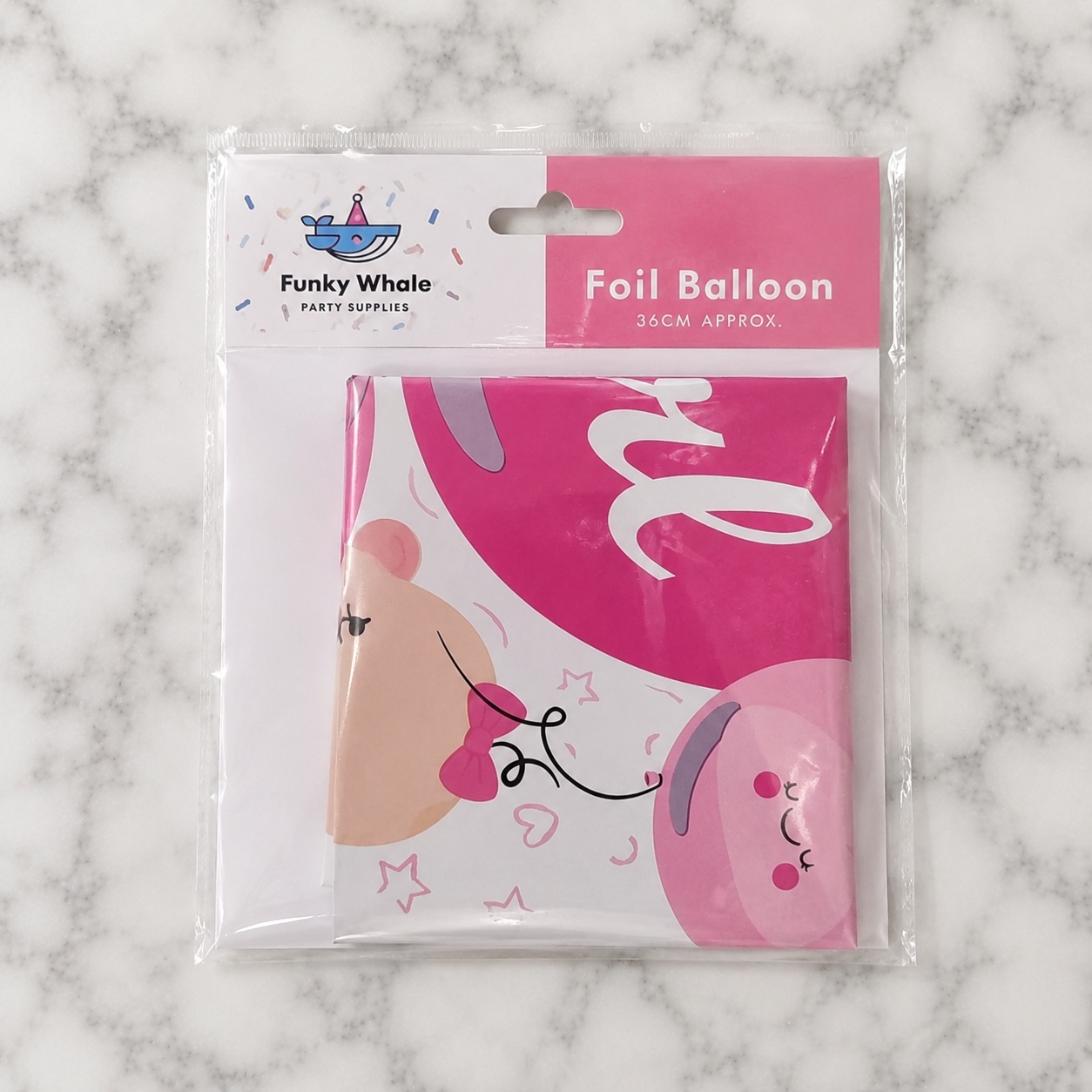 The It's a Girl foil balloon in its packaging