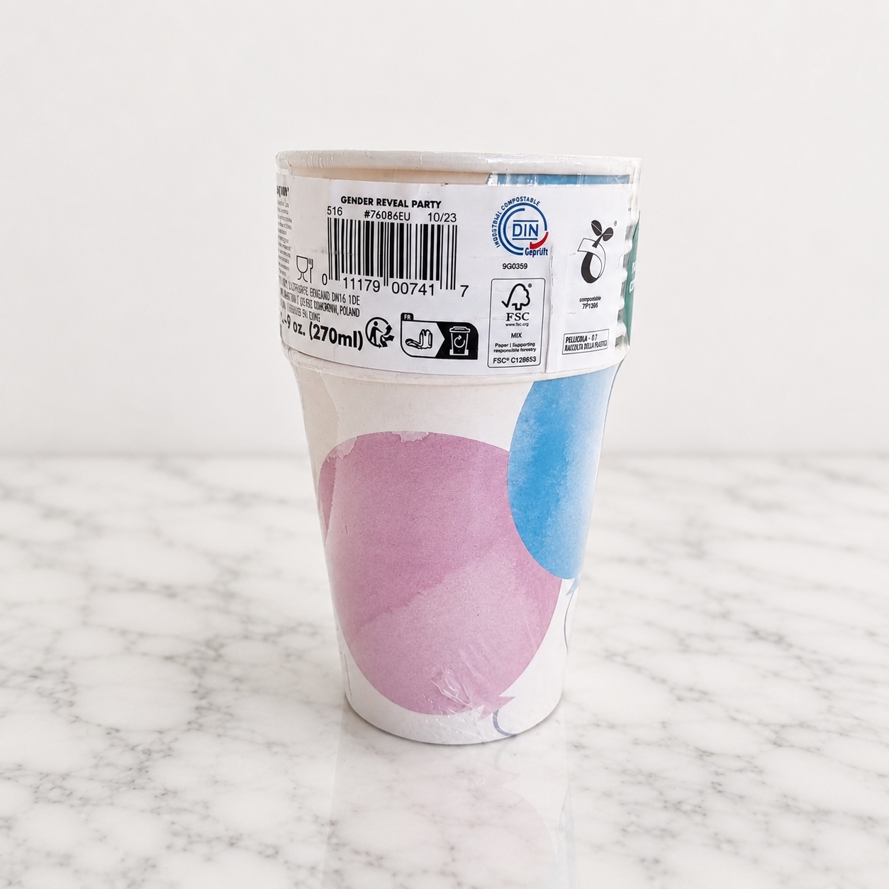 A single pastel party cup showing the label — 9 fl oz / 270ml, pack of 8