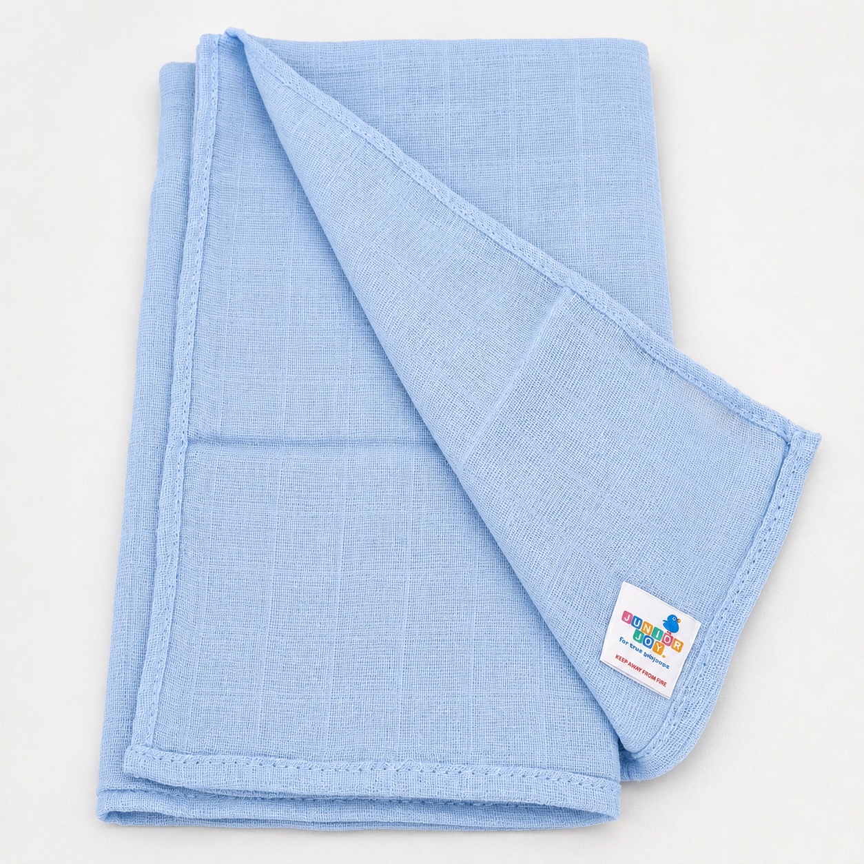 Soft blue muslin square included in the nappy cake
